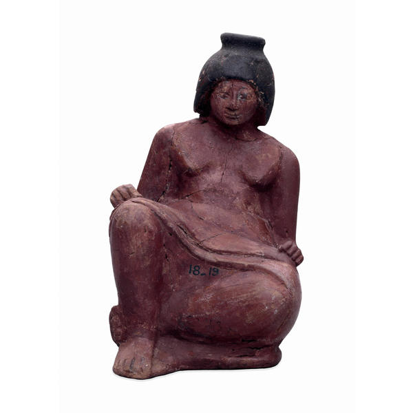 Terracotta flask in the form of a scribe