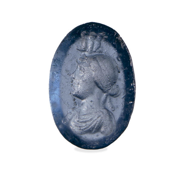 Blue glass intaglio with a portrait of Cleopatra VII